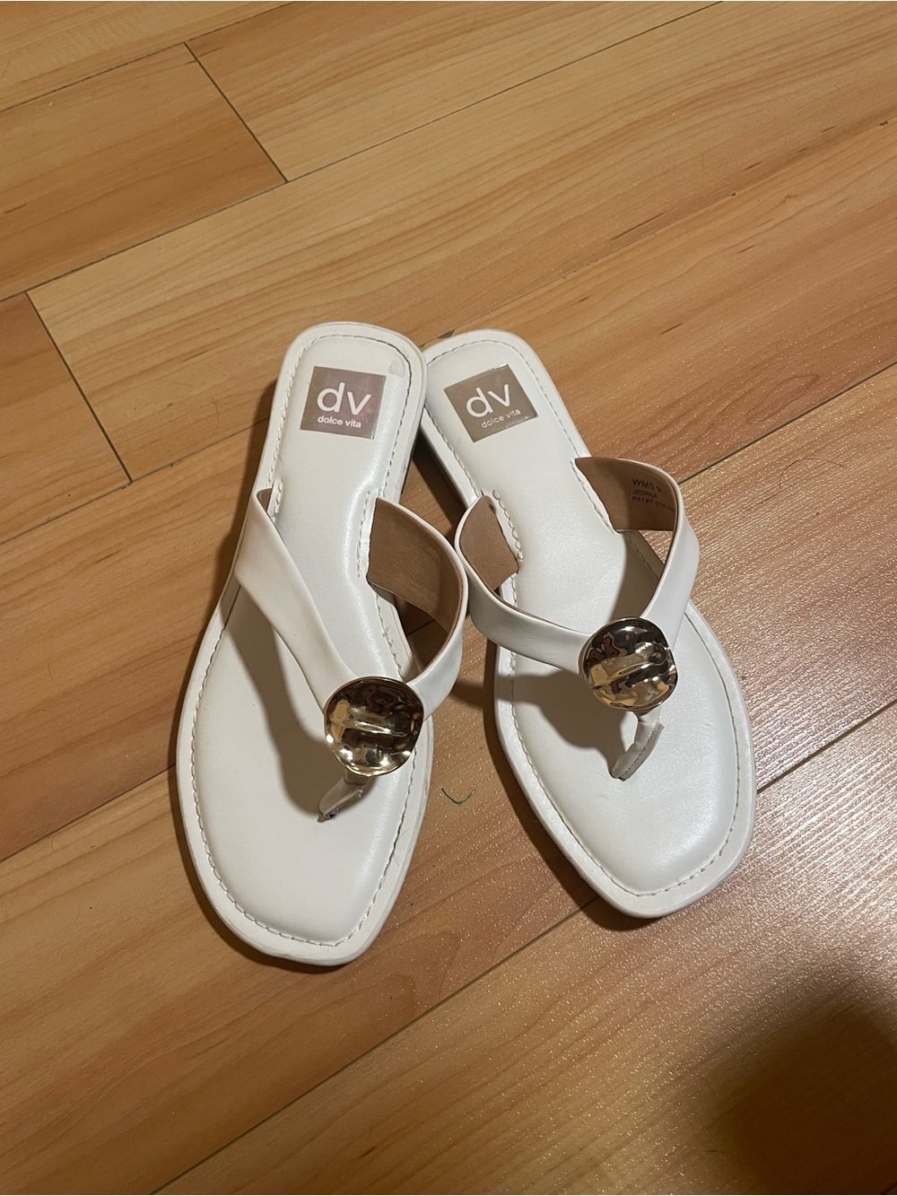 Dolce Vita White Thong Sandals with Gold Medallion